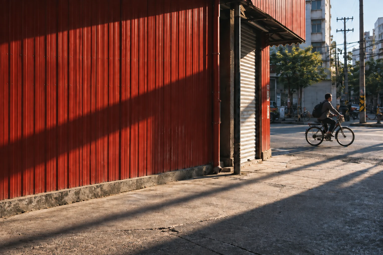 The same street photograph with the blue stool removed.